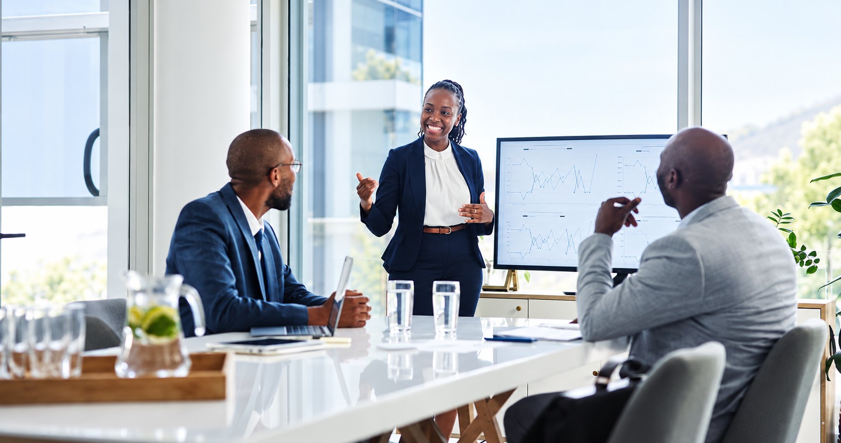 Professionals reviewing a project presentation